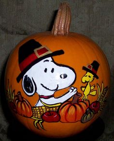 a pumpkin decorated with a cartoon character on it