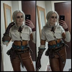 a woman is taking a selfie in front of a mirror with her cell phone