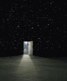 an open door leading to the stars in the sky