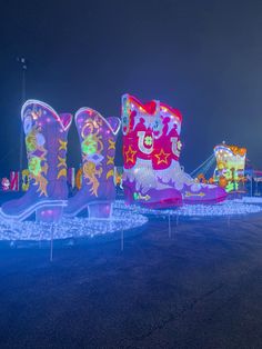 the boots are all lit up and ready to be used as decorations for an event