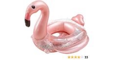 an inflatable pink flamingo floating on top of it's back legs