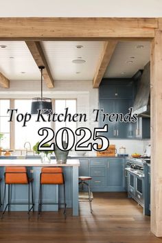 an open kitchen with blue cabinets and orange stools in the foreground text reads top kitchen trends 2055