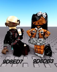 two dolls are sitting on the ground with their hands in each other's pockets