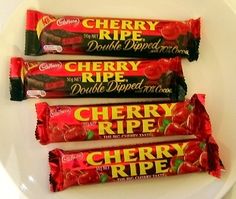 three bars of cherry ripe on a white plate