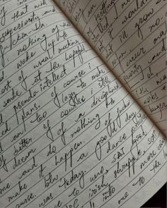 an open notebook with writing on it