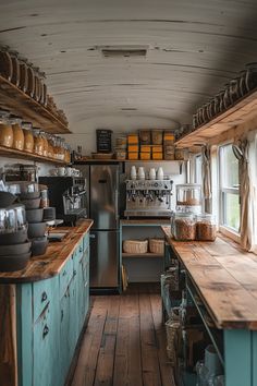 an old fashioned kitchen with lots of wooden counter tops