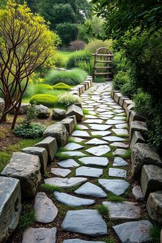 a stone path in the middle of a garden