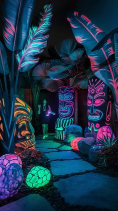 an outdoor area with colorful lights and palm trees in the background, including large plants