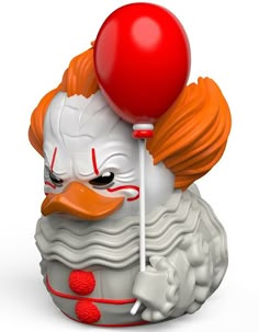 a white and orange clown with a red balloon