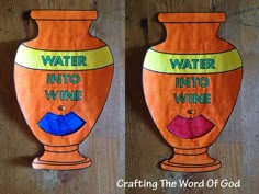 two orange vases with water into wine written on the front and bottom one is blue