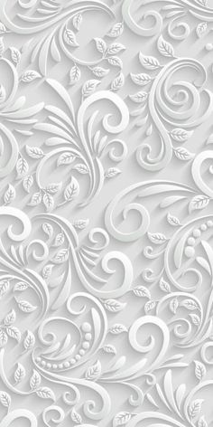 an abstract white background with swirls and leaves