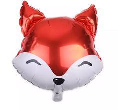 a red foil fox balloon on a white background