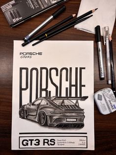 the porsche gt3 rs poster is next to some markers and pencils on a table