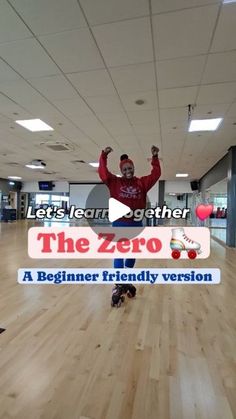 a man standing on top of a hard wood floor in an office building with his arms up