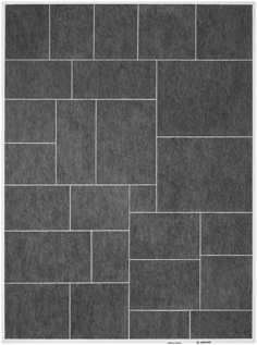 a black and white photo of a brick wall with grey tiles on the bottom half