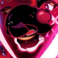 a cartoon character is smiling with his mouth open and tongue out in front of him