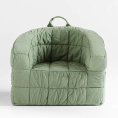 a green chair that is shaped like a bag