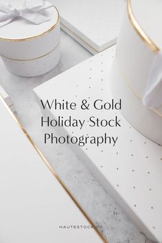 white and gold holiday stock photography with gift boxes in the background text reads, white & gold holiday stock photography