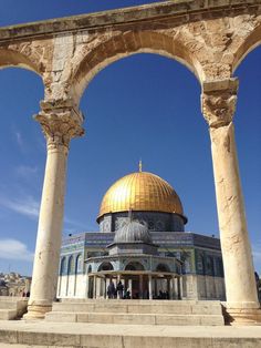 the dome of the rock is surrounded by pillars