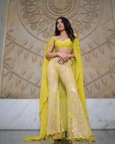 If you are looking for Haldi outfit ideas, then save this post for inspiration. Both bridesmaids and bride-to-be can wear this yellow dress for the Haldi ceremony. 💛  TAG  a friend who needs to see this.   Outfit @labelprernamehra Shot by @thetiltedlens Makeup & Hair @nishaxmua @hairstylist_juhi Jewellery @irasvafinejewellery Location @fsmumbai  #weddings #indianweddings #weddingideas #weddinginspiration #indianwedding #bride #groom #wedding #love #couple #matchingoutfits #haldi #haldiceremony #yellowlehenga #wishnwed #haldiceremony #indianwedding #weddingrituals   [ yellow, cape set , destination wedding, bridesmaids, bridesmaid, bride, sangeet, mirror work, wedding guest, blouse, Sharara, fusion, Indian designer ] Best Haldi Outfits For Bridesmaid, Yellow Haldi Outfit For Bridesmaid, Yellow Haldi Dress For Bridesmaid, Haldi Look For Bridesmaid, Trendy Haldi Outfits For Bridesmaid, Haldi Outfit For Groom Sister, Unique Haldi Outfits For Bride Sister, Haldi Outfit Inspo For Bridesmaid, Haldi Outfit Bridal Indowestern