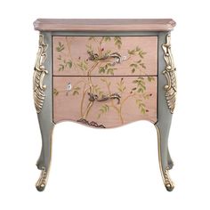 a pink and grey painted chest with birds on it