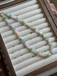 The Elda Pastel Gemstone Necklace features 8 mm Pink Quartz and Chalcedony stones set on a 14k gold-plated stainless steel chain measuring 40 + 5 cm (16 + 2 in) with a lobster clasp and extender for adjustable wear. Its soft pastel hues and natural gemstones offer a delicate, hypoallergenic accessory that resists tarnishing. Expertly handcrafted by Missophia, this necklace combines elegance with durability for everyday sophistication. - All items are made to order with care and intention. Details; Length: 36 +5 cm / 14 in + 2 in Stone: 8 mm Pink Quartz, Chalcedony Metal: 14k real gold pleated stainless steel Closure: Lobster clasp with extender Soft pastel colors, natural gemstone Hypoallergenic & tarnish-resistant Specially designed and handcrafted by Missophia Chalcedony Stone, Crafts From Recycled Materials, Pastel Hues, Pink Quartz, Recycled Sterling Silver, Real Gold, Stainless Steel Chain, Stone Settings, 14k Gold Plated