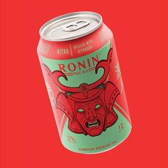 a can of beer with an image of a demon on the front and side, against a red background