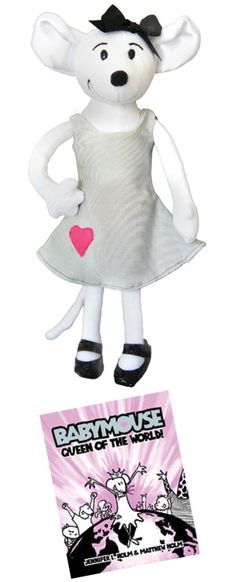 a white stuffed animal wearing a dress and hat
