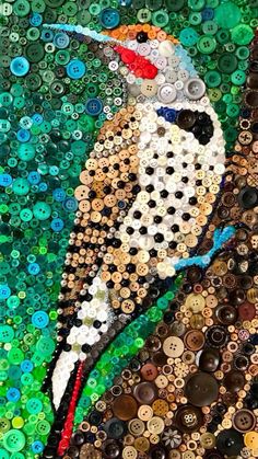 a bird made out of bottle caps and buttons