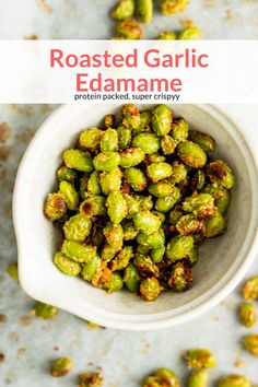 roasted garlic edamame in a white bowl