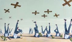 a group of people flying through the air while holding onto crosses