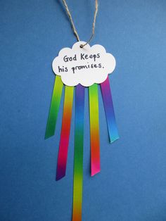 a paper cloud hanging from a string with the words god keeps his promises