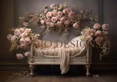 a bed with flowers on it and the words old designs in gold letters above it