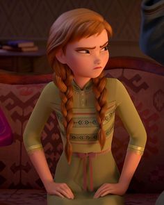 a cartoon girl with long hair and braids standing in front of a couch, looking at the camera