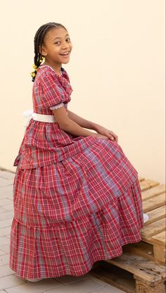 Jamaica’s national dress designed and made in Qatar for a child for the observance of International Day at school. Beneath the dress is a cotton crinoline purchased on Amazon to add volume to the dress while ensuring comfort. Photo: Tanya