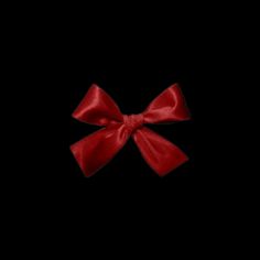 a red bow on a black background