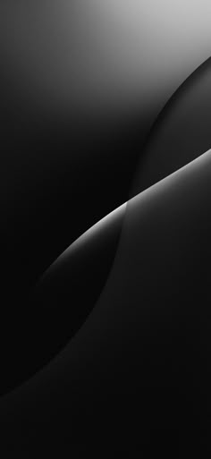 an abstract black and white photo with wavy lines