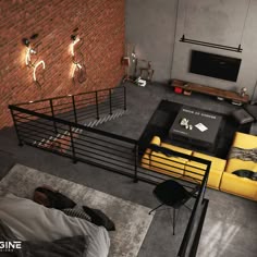 an aerial view of a living room with yellow furniture and brick walls, including a black iron railing