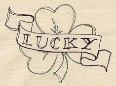 a drawing of a clover with the word lucky on it's side and a ribbon in the middle