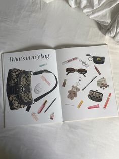 an open book on what's in my bag is laying on a white sheet