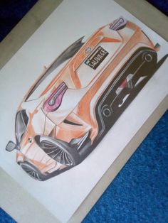 a drawing of a sports car on paper
