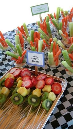 fruits and veggies are on display at a party