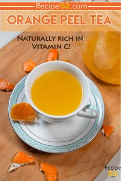 a cup of orange peel tea on a plate