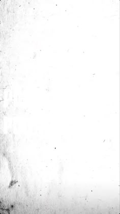 an old black and white photo of a clock tower