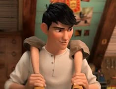 a man holding a doll in his arms