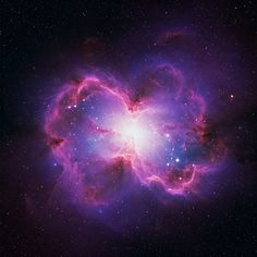 an image of a star in the sky with purple and blue colors, as well as stars