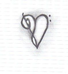 a drawing of a heart on lined paper