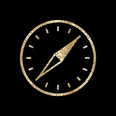 a gold clock face on a black background