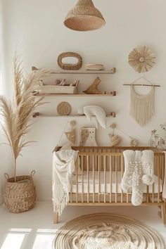 a baby crib in a white room with lots of decor