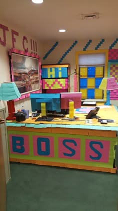 a desk with legos on it in the middle of a room